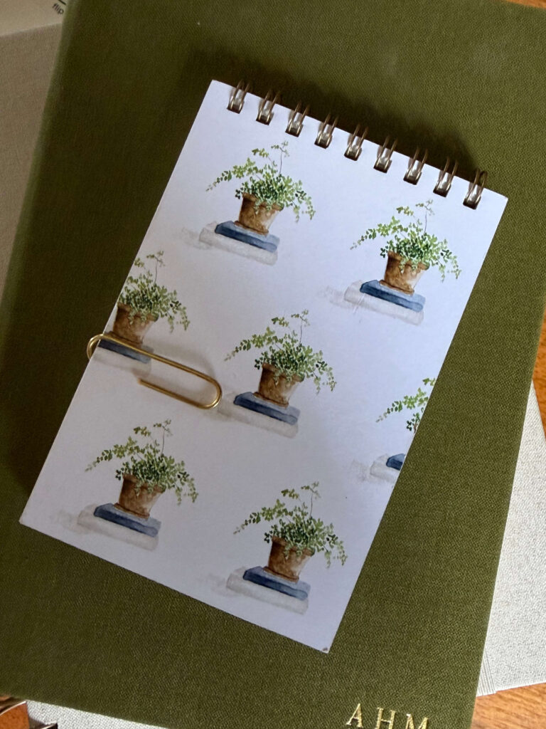 overhead photo of client tracking notebook